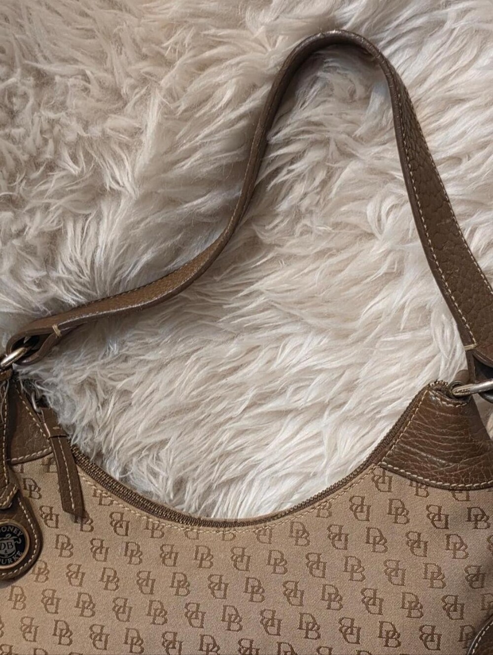 Dooney & Bourke brown & tan medium hobo bag with repeating DB monogram